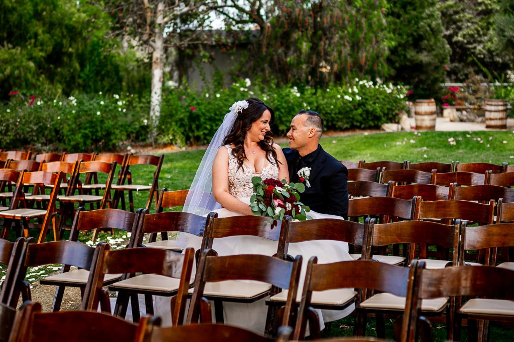 bride and groom sitting down